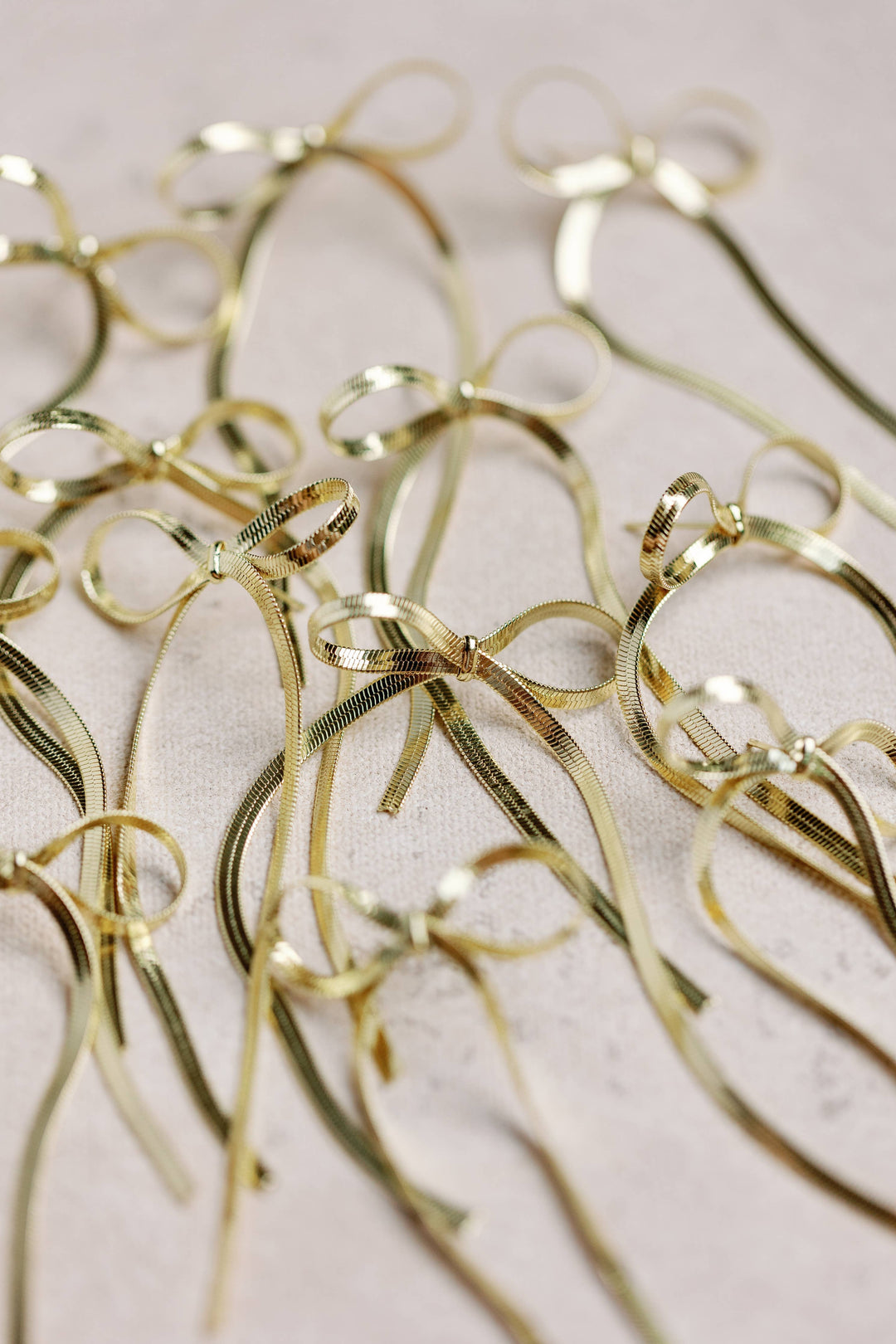 Maxi Gold Duster Bow Earrings Womens Earrings St Armands Designs of Sarasota 