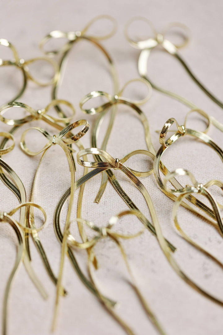 Maxi Gold Duster Bow Earrings Womens Earrings St Armands Designs of Sarasota 